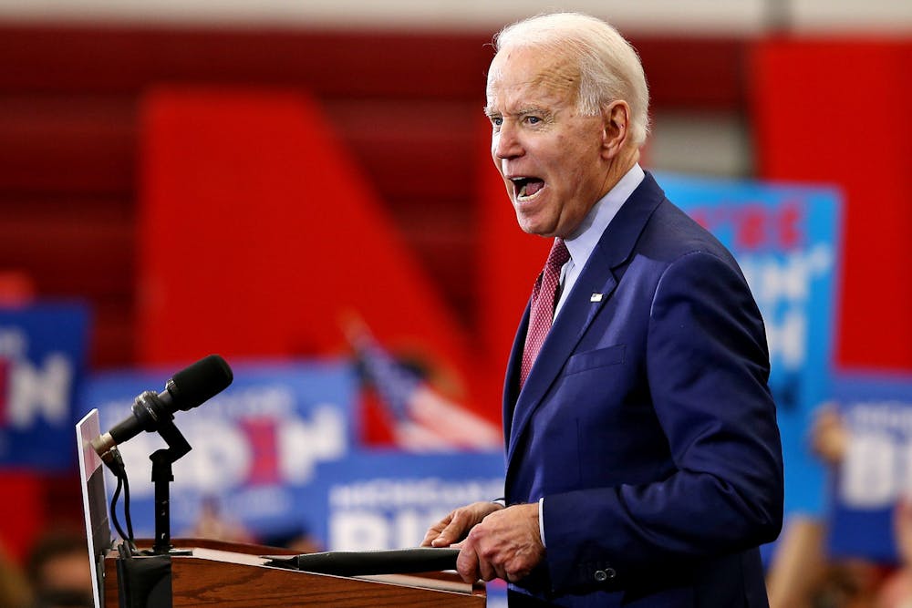 <p>Former Vice President Joe Biden addresses supporters during a campaign rally March 9 at Renaissance High School in Detroit.</p>
