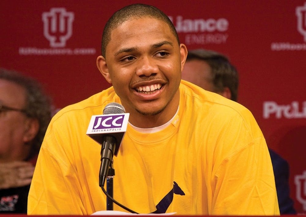IU freshman Eric Gordon laughs during a press conference to declare his intentions to enter the NBA Draft April 7 at the Jewish Community Center in Indianapolis. Gordon, IU's top scorer during the season, set a school record for most points scored by a freshman.