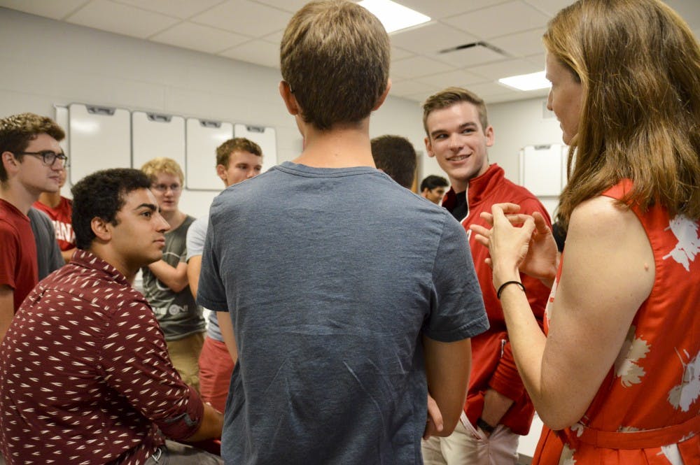 The first class of IU engineering students engage in conversation during their first day in the School of Informatics and Computing’s new Intelligent Systems Engineering major Monday morning in the Geology building. 