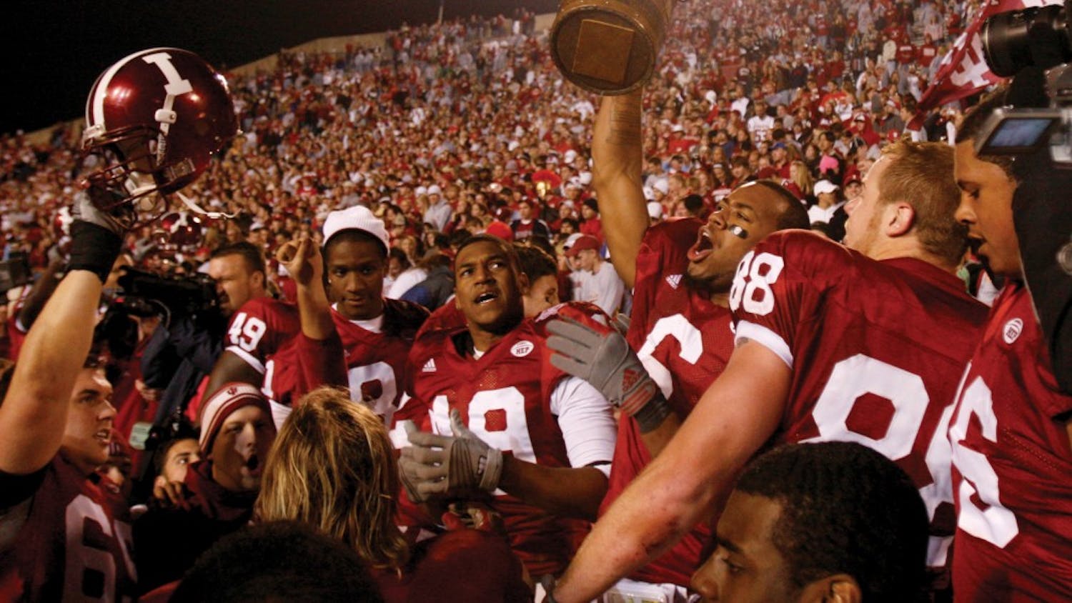Members of the IU football team celebrate after winning the Old Oaken Bucket game against Purdue on Nov. 17, 2007. The victory meant IU finished the regular season with a 7-5 record, guaranteeing the Hoosiers a spot in a postseason bowl game.