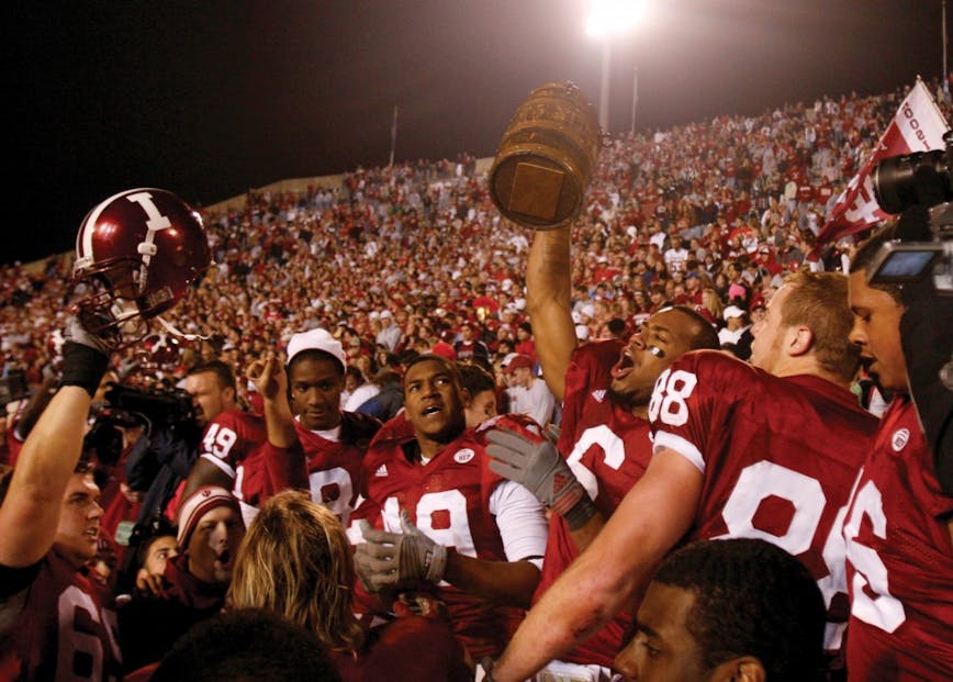 Members of the IU football team celebrate after winning the Old Oaken Bucket game against Purdue on Nov. 17, 2007. The victory meant IU finished the regular season with a 7-5 record, guaranteeing the Hoosiers a spot in a postseason bowl game.