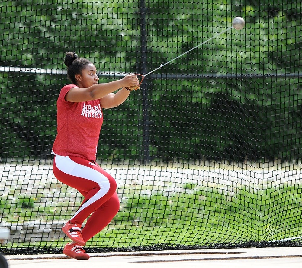 Nakel McClinton participates in the weight throw during the Billy Hayes Invitational on May 3, 2014.