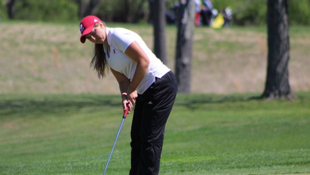 Then-sophomore Erin Harper, now a junior, putts during the first round of the IU Invitational at the IU Golf Course in April. Harper finished 34-over-par after three rounds at the NCAA Championships in Stillwater, Oklahoma.