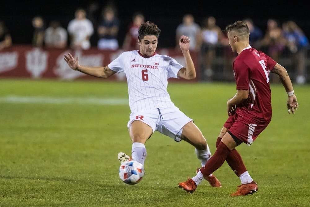 <p>Senior defender Nyk Sessock passes the ball Sept. 17, 2021, at Bill Armstrong Stadium. Indiana men&#x27;s soccer will play Northwestern at 8 p.m. Tuesday in Evanston, Illinois.</p>