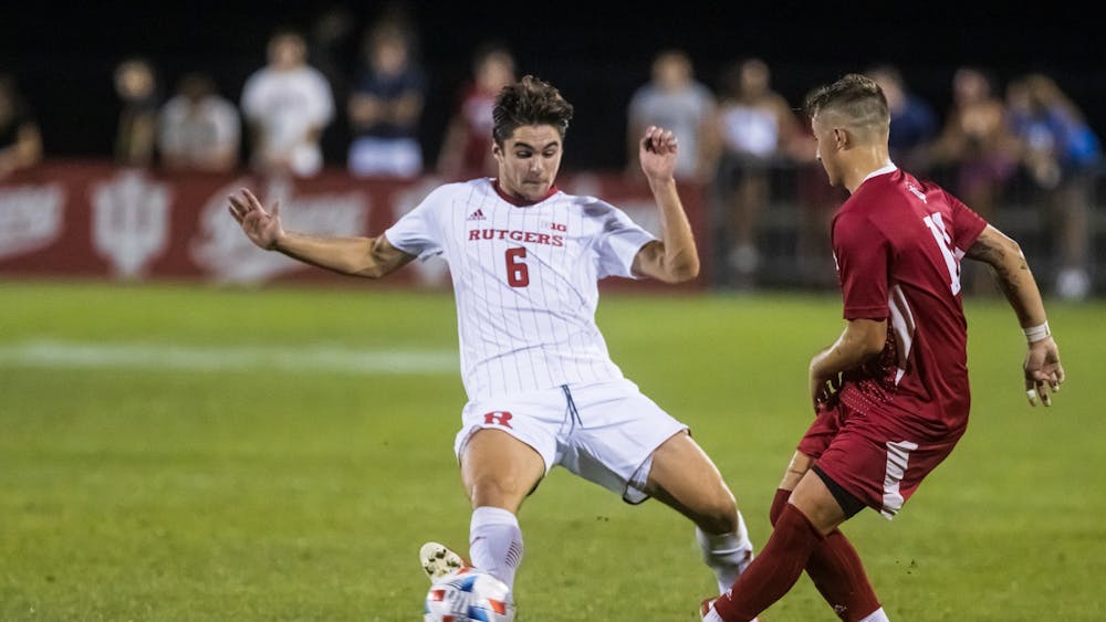 Senior defender Nyk Sessock passes the ball Sept. 17, 2021, at Bill Armstrong Stadium. Indiana men&#x27;s soccer will play Northwestern at 8 p.m. Tuesday in Evanston, Illinois.