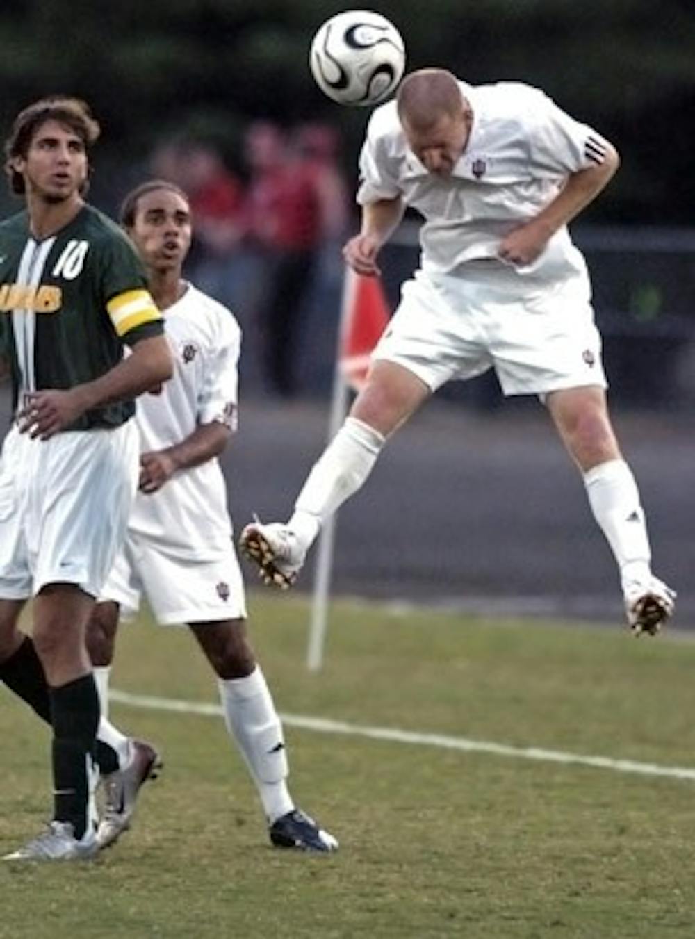 Pete Stuttgen
IU freshman forward Michael Roach heads the ball as IU sophmore midfielder Kevin Alston and University of Alabama Birmingham junior midfielder/forward Dejan Jakovic watch on Saturday, Sept. 22, at Bill Armstron Stadium. Jakovic scored both goals against the Hoosiers, giving UAB the 2-1 win.