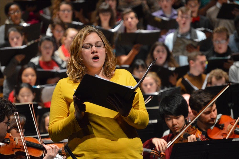 Megan Wilhelm, second-year master's student in the Jacobs School of Music, practices her solo during rehearsal for "Vaughan Williams: 'A Sea Symphony.'" The oratorio Chorus and Concert Orchestra will perform the piece at 8 p.m. today in the Musical Arts Center. 