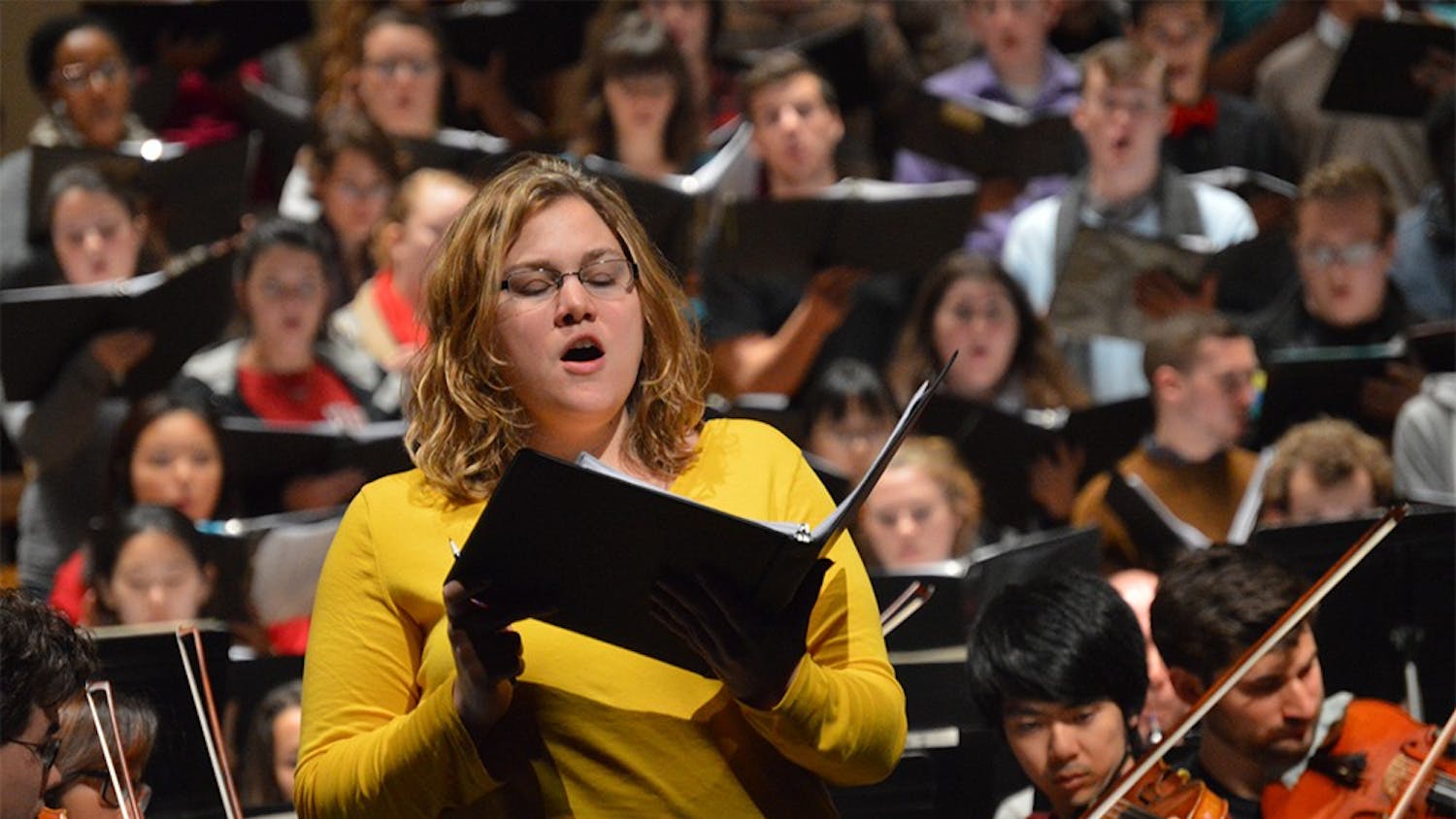 Megan Wilhelm, second-year master's student in the Jacobs School of Music, practices her solo during rehearsal for "Vaughan Williams: 'A Sea Symphony.'" The oratorio Chorus and Concert Orchestra will perform the piece at 8 p.m. today in the Musical Arts Center. 