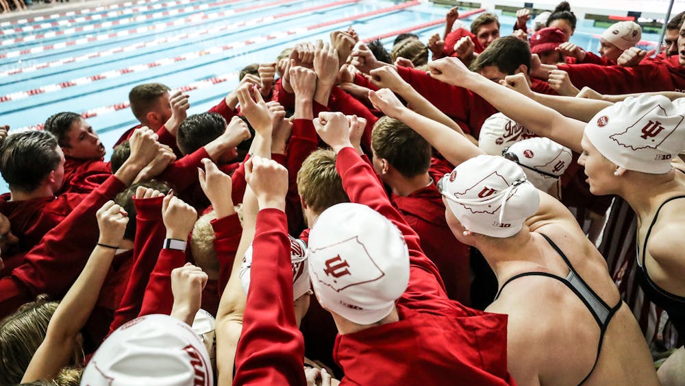The IU women&#x27;s swim and dive team huddles. Freshman swimmer Ryley Ober was training for the NCAA Championships before spring sports were canceled.