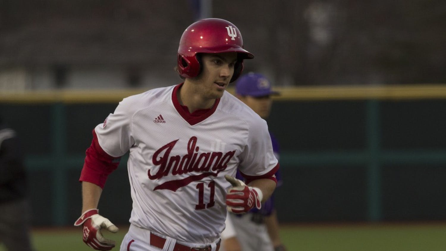 Shortstop Brian Wilhite jogs to homplate after his homerun during the seventh inning of play against Western Carolina University on Friday night. The Hoosiers won 3-2.
