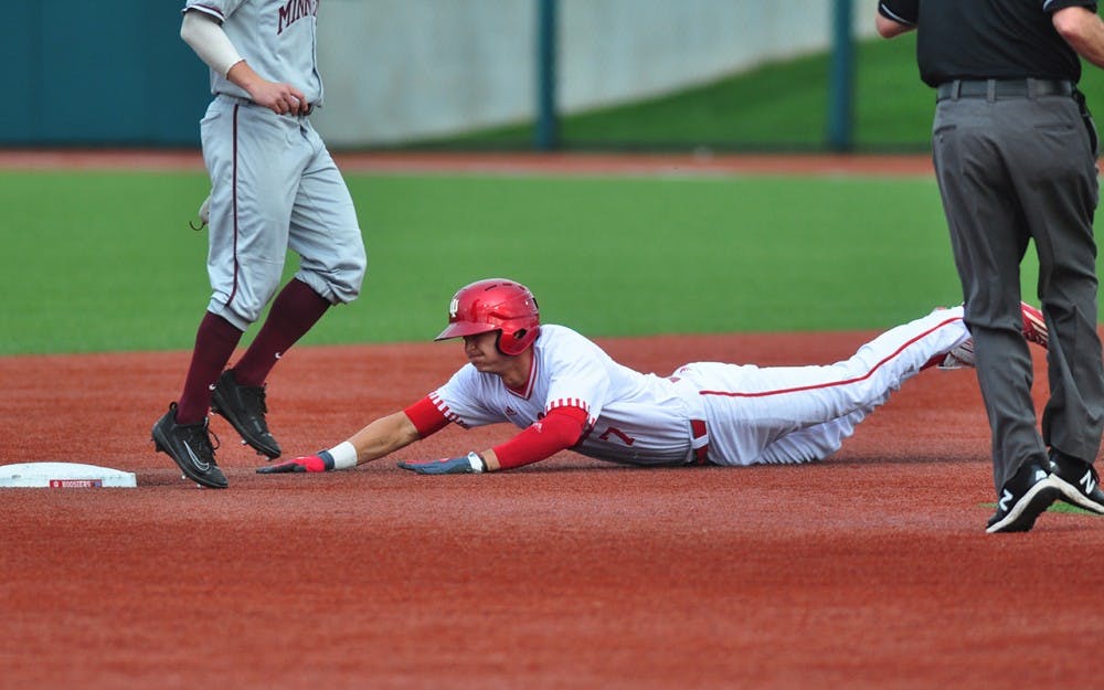 Matt Gorski slides in to second base on Friday at Bart Kaufman Field. IU lost to Minnesota 11-0.