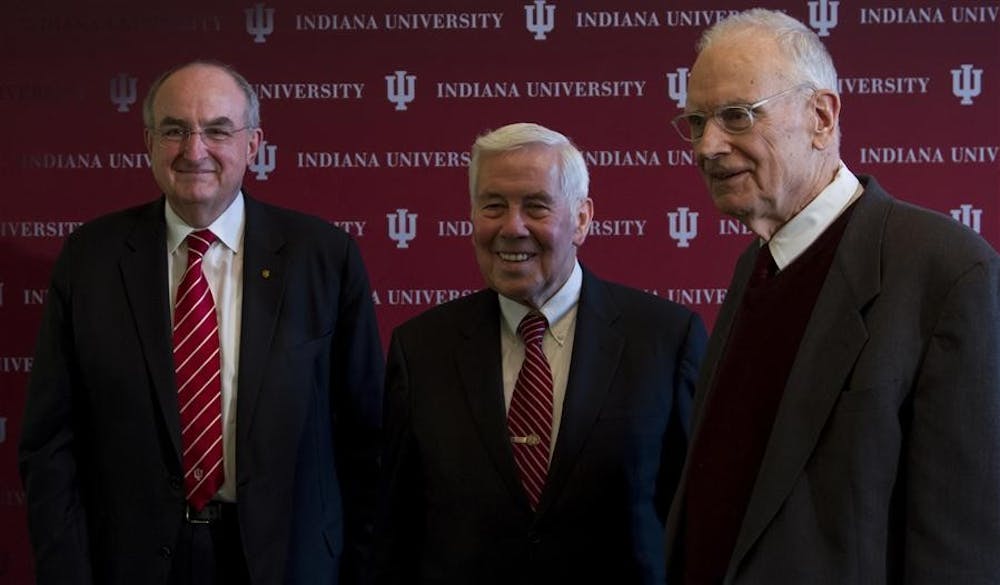 Former Indiana Sen. Richard Lugar poses for a photo with Lee Hamilton and IU president Michael McRobbie on Thursday afternoon at the Lilly Library. McRobbie announced that Lugar and Hamilton will become faculty members at IU's School of Global and International Studies.