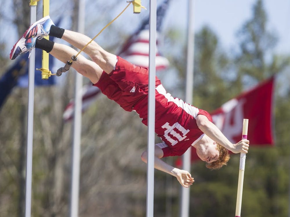 Then-junior pole vaulter Nathan Stone flies over the bar April 23, 2022, at the Robert C. Haugh Complex. Indiana track and field had a strong weekend competing in Tennessee and California.