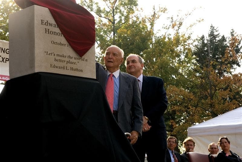 Edward L. Hutton lifts the cloth on Oct. 17, 2007 during the unveiling of the Hutton Honors College cornerstone. Hutton recently donated approximately $9 million to the university.