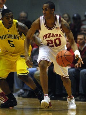 IDS File PhotoJunior guard A.J. Ratliff drives past Dion Harris during the second half of the IU victory over Michigan Saturday, Jan. 27, 2007 at Assembly Hall.  Ratliff scored nine points off the bench for the Hoosiers.