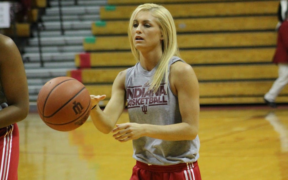 Junior guard Tyra Buss practices shooting during Hoosier Hysteria on Saturday evening in Assembly Hall.