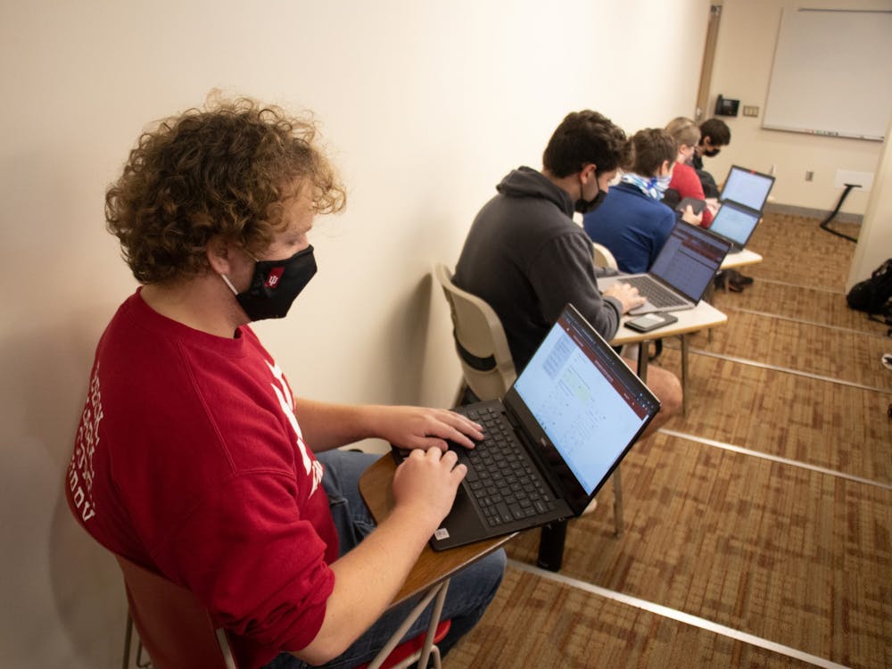 Junior Corbin Dubois looks at his computer during class on Oct. 21, 2021, in Franklin Hall. 