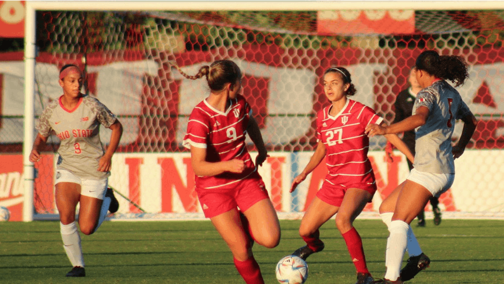 Redshirt freshman midfielder Ava Akeel prepares to pass the ball to sophomore forward Jordyn Levy on Sept. 29, 2022, at Bill Armstrong Stadium. Indiana lost to Ohio State 4-0 on Thursday. 