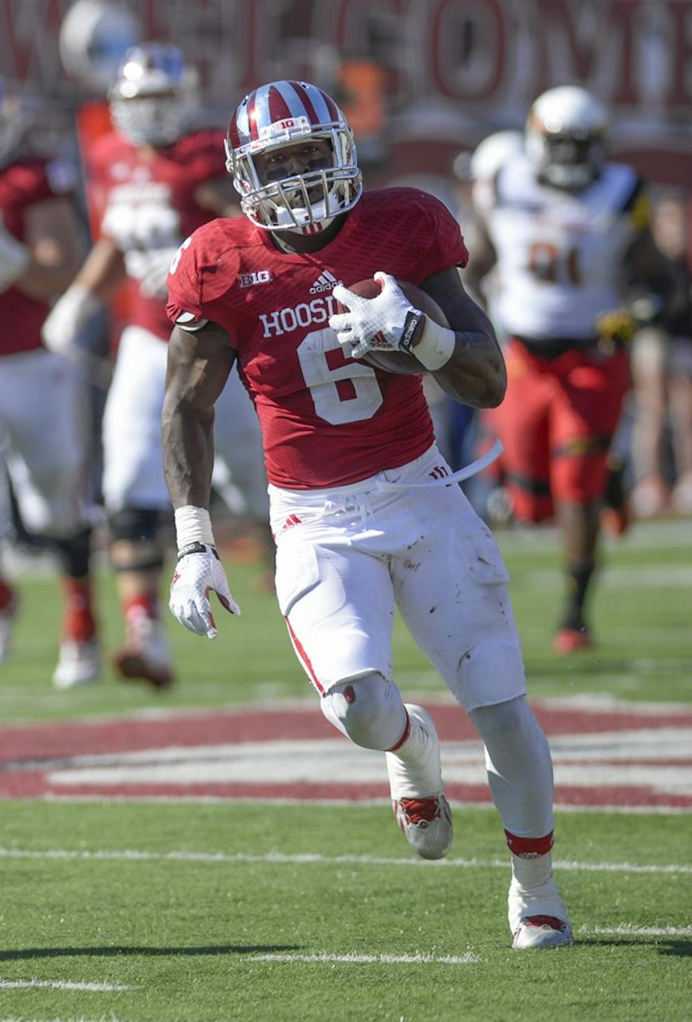 Junior running back Tevin Coleman breaks off a run during IU's game against Maryland on Sept. 27 at Memorial Stadium.