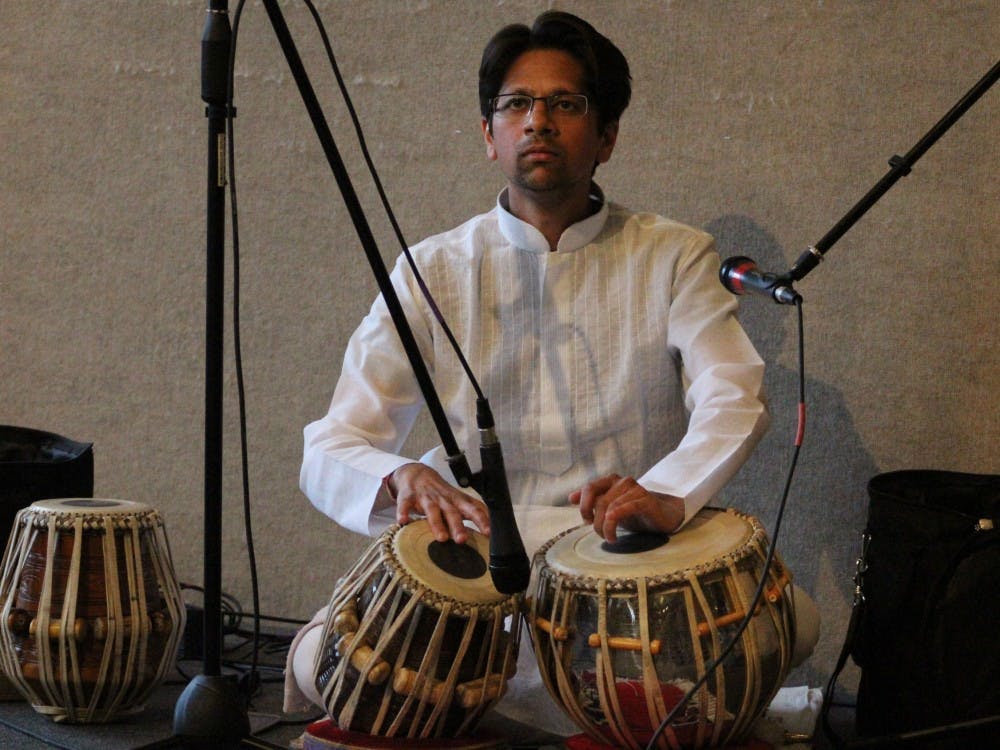 Akshat Gupta, a masters student at IU, performs a selection of classical Bengali songs written by Rabindranath Tagore. Gupta played a tabla set with composed and improvised rhythms as part of the Asian American Pacific Islander talent showcase on Wednesday, April 4.&nbsp;
