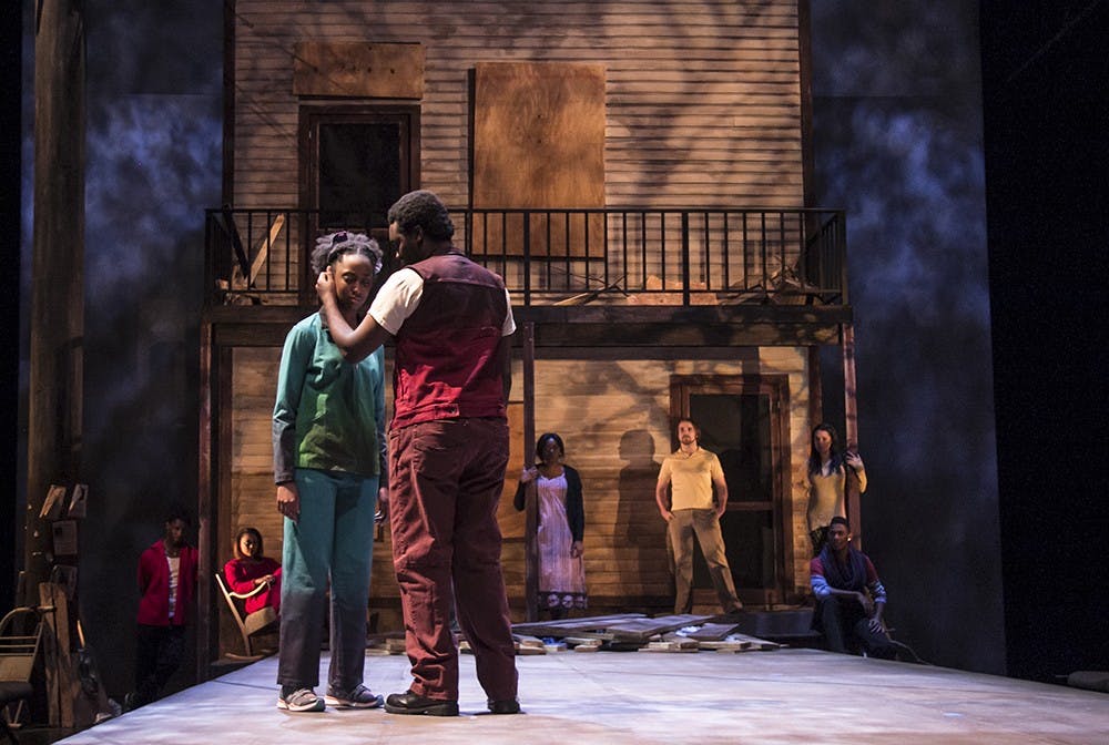 Oya, left, played by Patricia Millard, performs with Shango, played by Ian Martin, during the dress rehearsal of "In the Red and Brown Water" on the Monday.