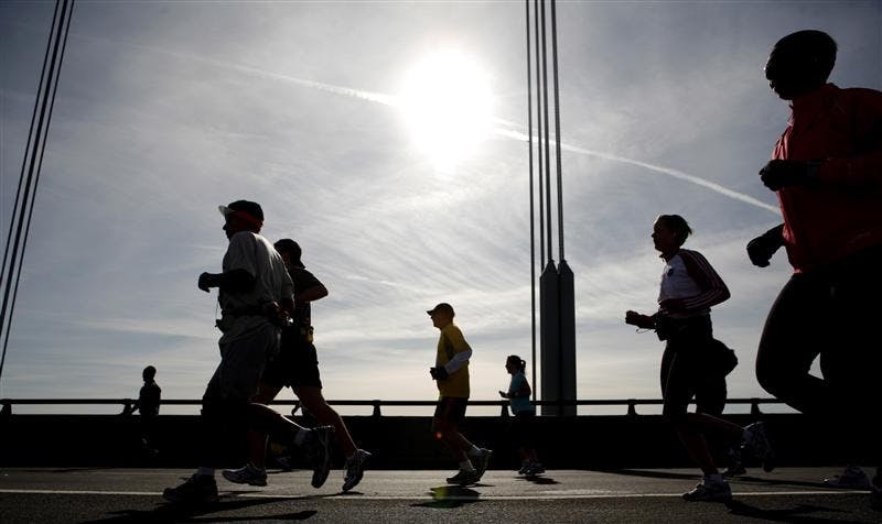 Runners cross the Verrazano Narrows Bridge at the start of the ING New York City Marathon on Sunday in New York.  