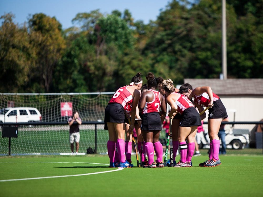 The IU field hockey team huddles before its match against Northwestern. The Hoosiers defeated the Wildcats 2-1.
