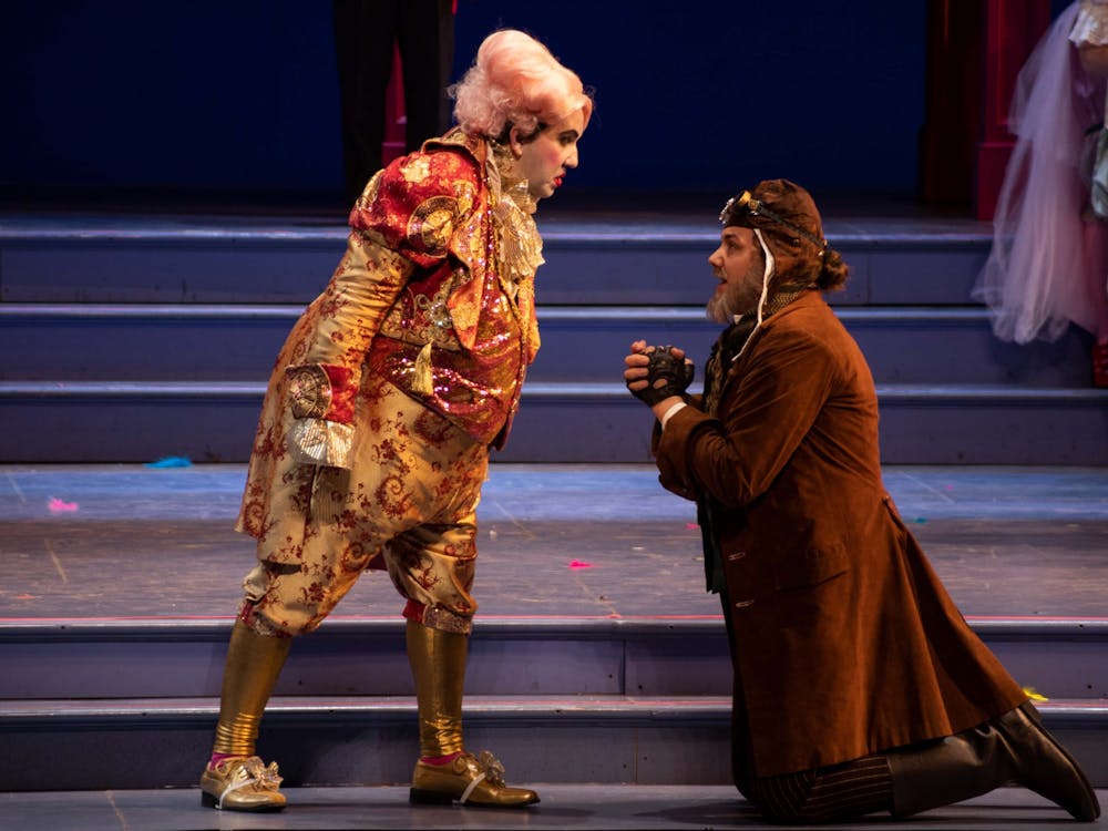 Conor Brereton, who plays King Ouf, and Theo Harrah, who plays Siroco, are seen onstage Oct. 18, 2022, at the Musical Arts Center. In the show, Siroco begged for his life after the king had become convinced he was tricked.  