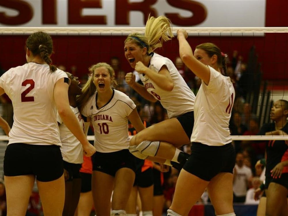 The Hoosiers celebrate their first round NCAA win again the University of Miami on Friday in University Gym. 
