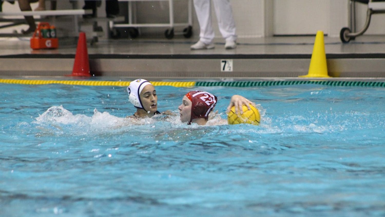 IU junior Sarah Young defends the ball from Califorina Baptist University during the first quarter of Saturday evening's match. Young scored five goals to help the Hoosiers defeat the Lancers 13-6.
