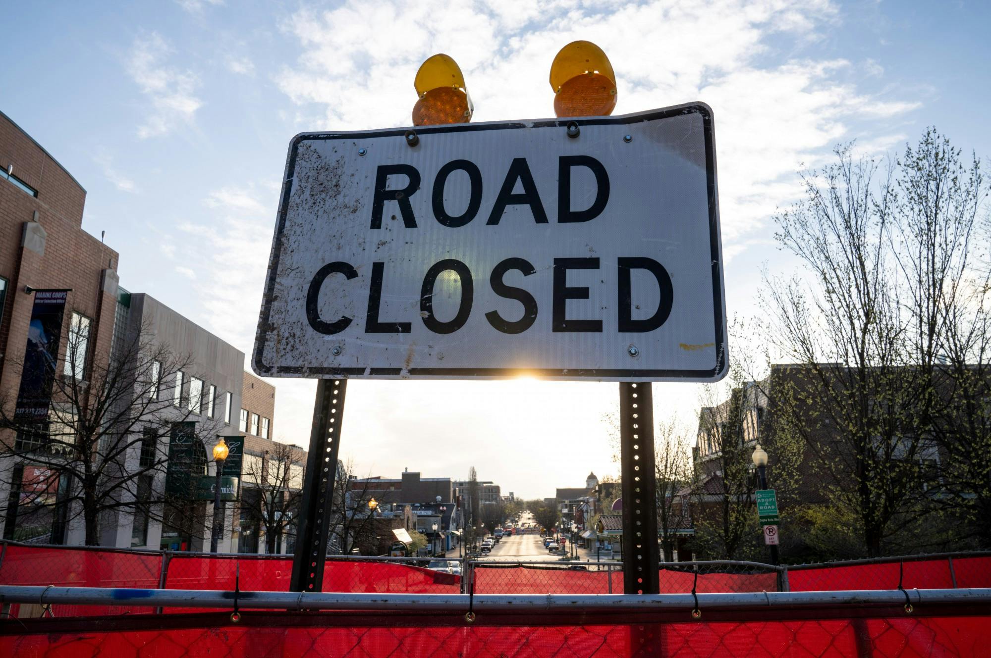 A crosswalk construction sign is pictured April 8 at Kirkwood and Indiana avenues. ﻿Various road-improvement and infrastructure projects in Bloomington have started during Gov. Eric Holcomb’s stay-at-home order, which is scheduled to last until April 20.