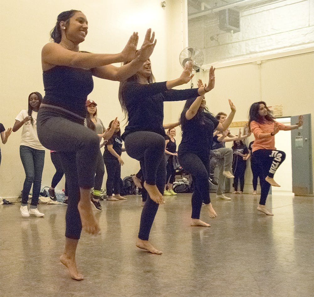 Students participate in bollywood dance hosting for Asian American and Pacific islander Heritae Month on Wednesday evening at Hyper. 