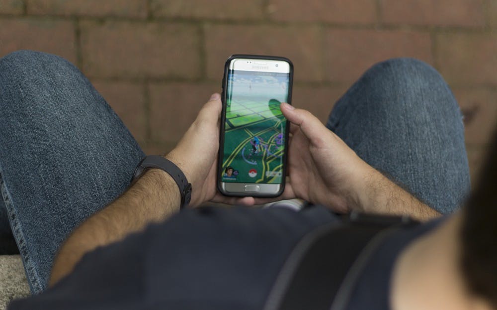 Students gathered Tuesday afternoon to play Pokemon Go throughout campus.