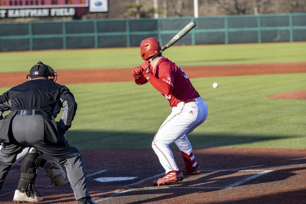 <p>Redshirt junior catcher Matthew Ellis watches a pitch come in during a game against Purdue Fort Wayne on March 9, 2022, at Bart Kaufman Field. Indiana left 26 total runners stranded on base in its three losses to Rutgers over the weekend.</p>