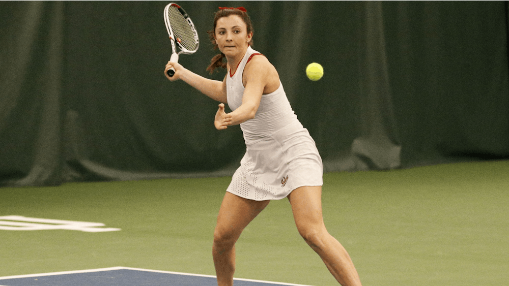 Senior Michelle McKamey returns a shot from her Ball State University opponents. Ball State defeated IU in all three doubles matches Feb. 23 in Bloomington. 