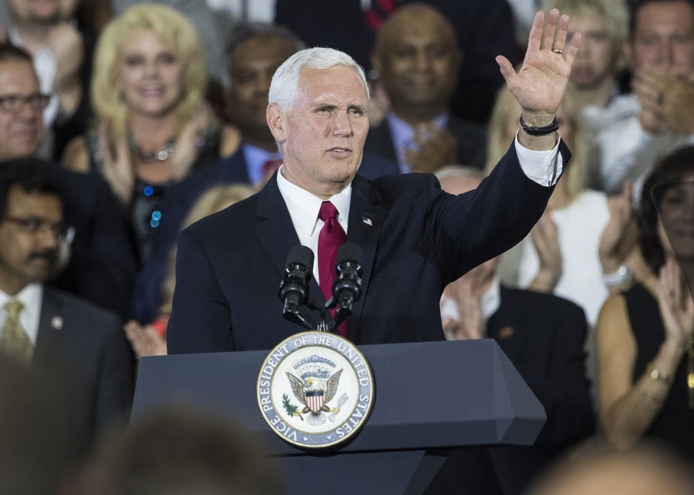 Vice President Mike Pence speaks at the Wylam Center of Flagship East on Friday. Pence discussed tax reform, national security and healthcare. "Indiana knows the truth," said Pence."Tax cuts mean more jobs. Tax cuts mean high wages for our families. Tax cuts mean creating an economy where anything is possible, where anyone can achieve anything."