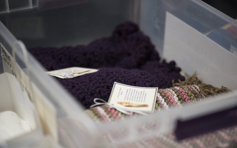 The women who knit for St.Paul's Shawls say it takes a long time to fill up a bucket with shawls, but once they give them to a charity like Hannah's House or the Shalom Center, they're gone within minutes. Most of the shawls go to charities, baptised babies and sick parishoners from St. Paul's. 