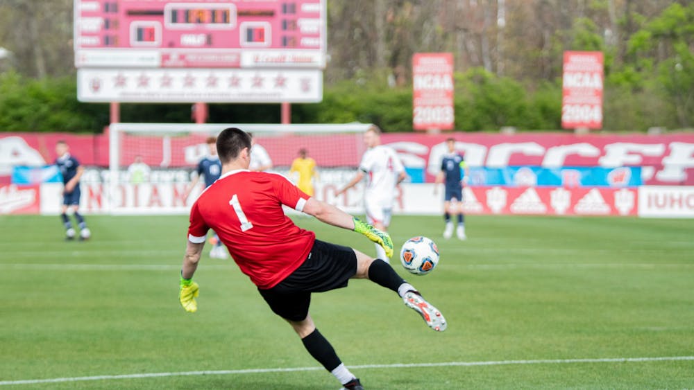 Sophomore Goalkeeper Roman Celentano kicks the ball against Penn State in the Big Ten Men’s Soccer Tournament Championship on April 17 in Bill Armstrong Stadium. IU defeated the University of Pittsburgh 1-0 Friday to advance to the NCAA Championship.