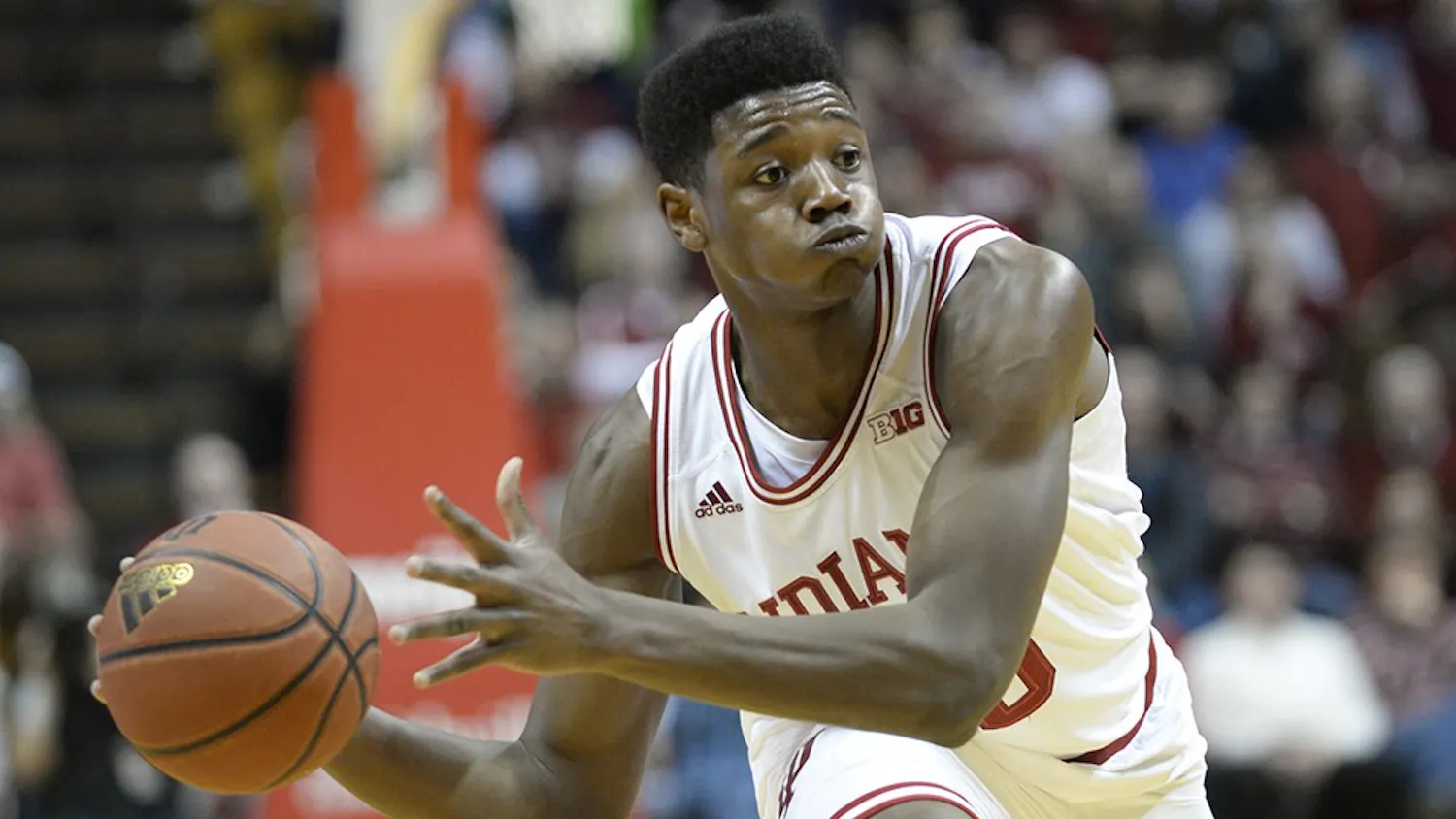 Freshman Emmitt Holt looks to pass to a teammate during IU's game against Penn State on Tuesday at Assembly Hall.