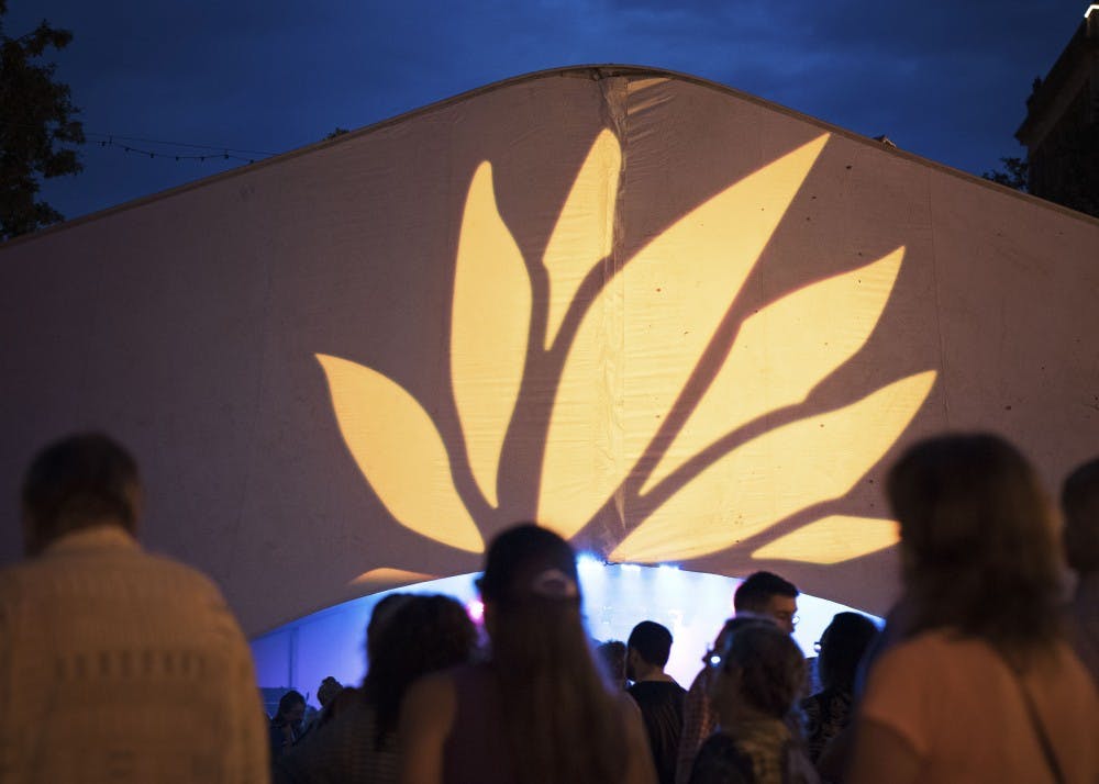 <p>The Lotus Festival logo was displayed on the Pictura Gallery/Old National Bank Tent last year. WFHB’s World Music Director Adriane Pontecorvo discussed the Lotus bands that will be featured in the station’s Lotus Live sessions this weekend.&nbsp;</p>