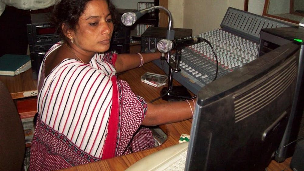 HYDERABAD, India - A woman hosts a radio program  in Telugu, the local language, Oct. 10. The radio station - for women, by women and completely independent -  is the of its kind in the Andhra Pradesh area and was made possible by the Indian NGO Deccan Development Society.