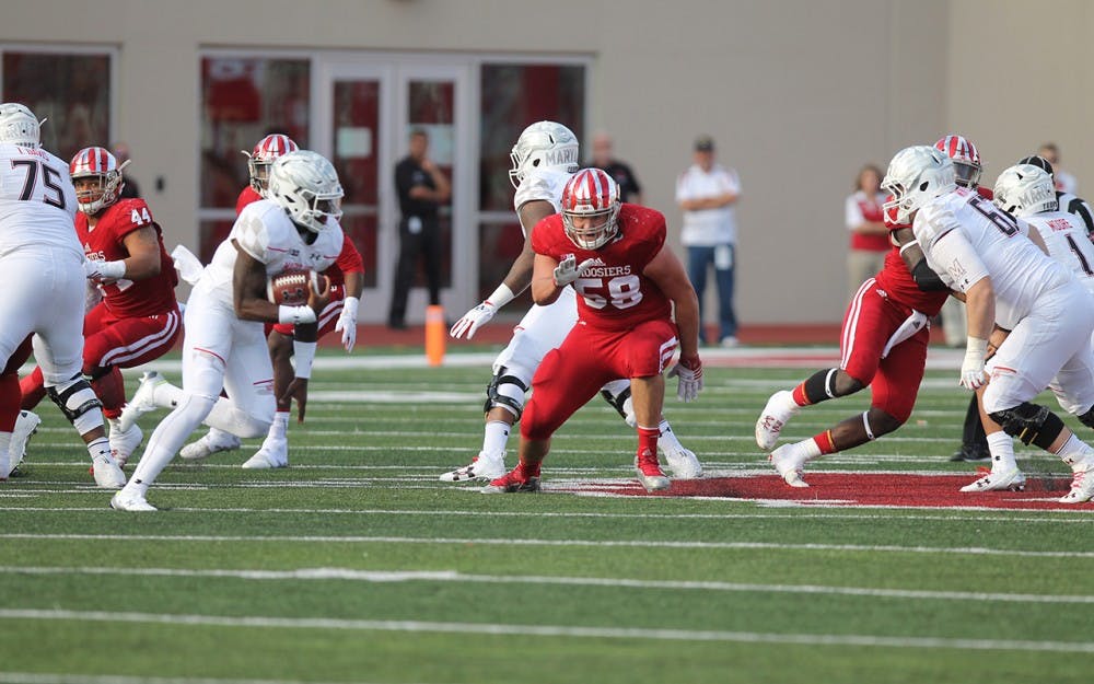 Defensive lineman Patrick Daughtry rushes toward the Maryland ball carrier. IU defeated Maryland 42-36 on Saturday evening at Memorial Stadium.