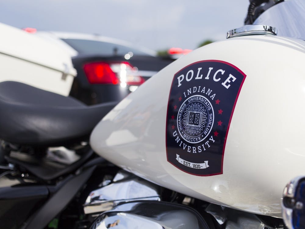 The IU Police Department crest is displayed on an IUPD motorcycle at the “Touch a Truck” event on July 2, 2018, in the Chick-fil-A parking lot on East Third Street. The IU Police Department said its policy to not include specific locations of sexual assaults on its public crime log is to protect survivors.