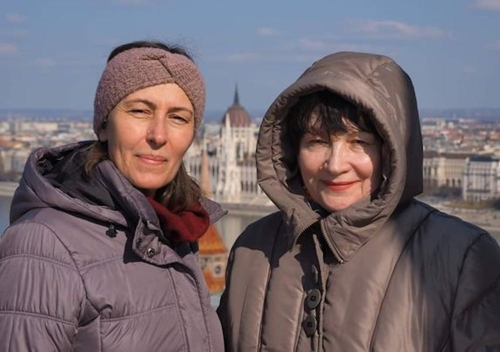 <p>Tatiana Nekriach, right, a 74-year-old Ukrainian refugee, is seen with Olena Szabo on March 6, 2022, at one of the castles in Pest, Hungary. Nekriach embarked on an 11-day journey to Cologne, Germany, on March 1.</p>