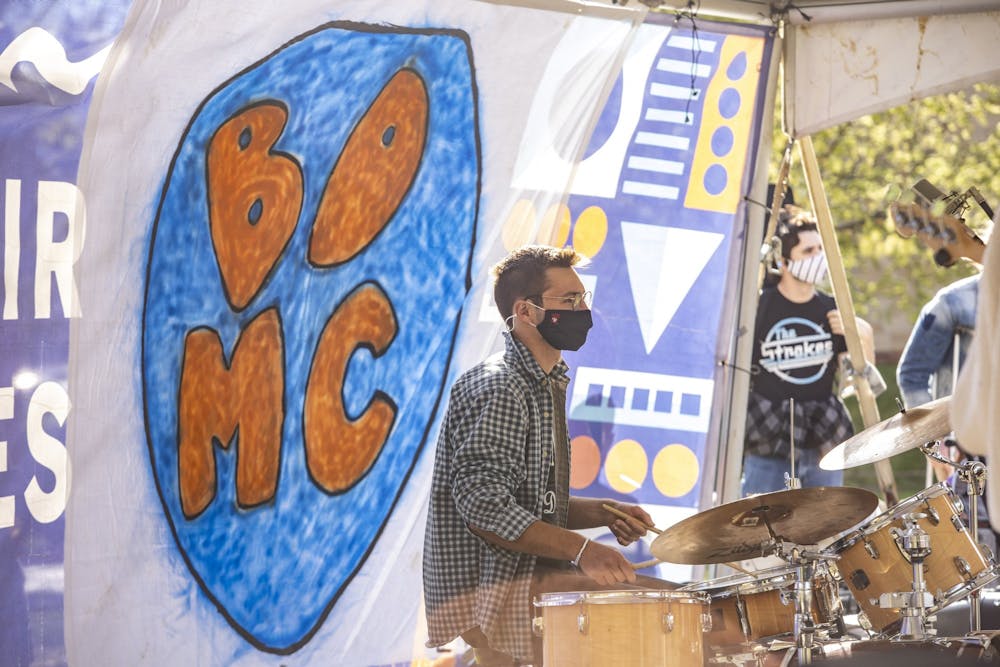<p>Then-senior Brian Healey plays the drums during the BDMC Presents concert April 15, 2021, in Dunn Meadow. BDMC will host its second annual BDMC Presents music festival from 4-10 p.m on April 15 in Dunn Meadow.</p>