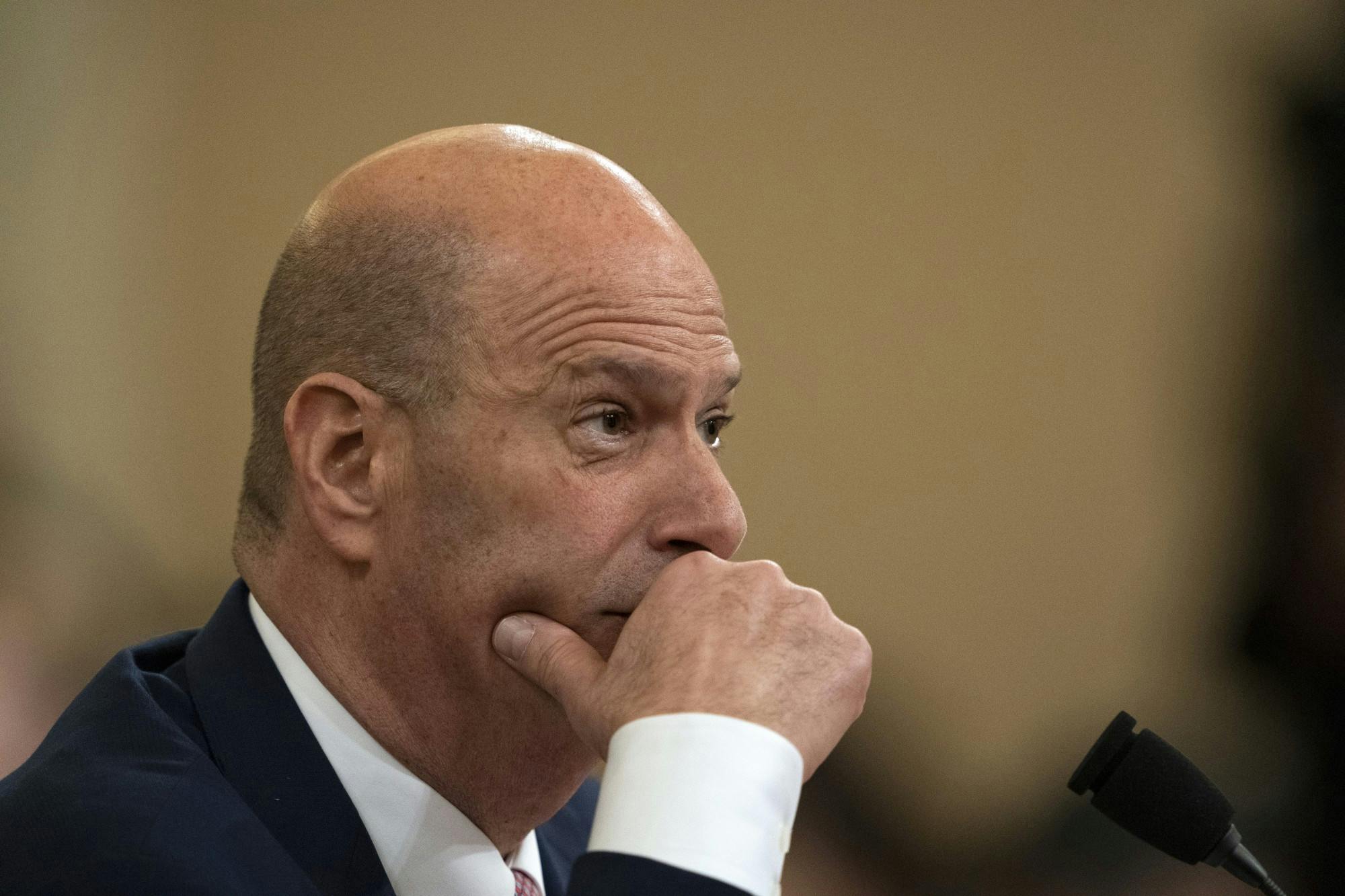 Gordon Sondland, the U.S. ambassador to the European Union, testifies before the House Intelligence Committee on Wednesday in the Longworth House Office Building on Capitol Hill in Washington, D.C. The committee heard testimony during the fourth day of open hearings in the impeachment inquiry against President Donald Trump, whom House Democrats say held back U.S. military aid for Ukraine while demanding it investigate his political rivals.