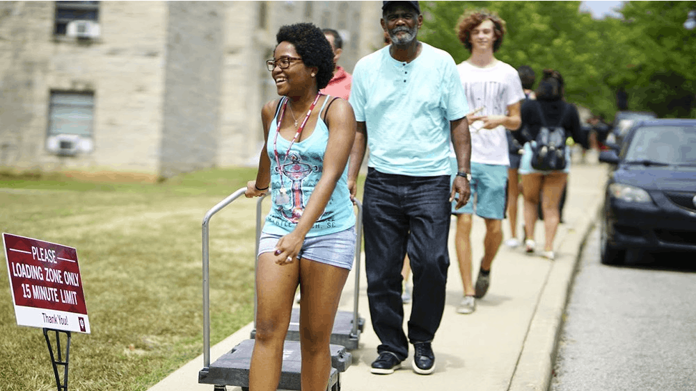 Families navigate heavy traffic and large crowds throughout IU’s central neighborhood during the official move-in day and Welcome Week events in 2017.