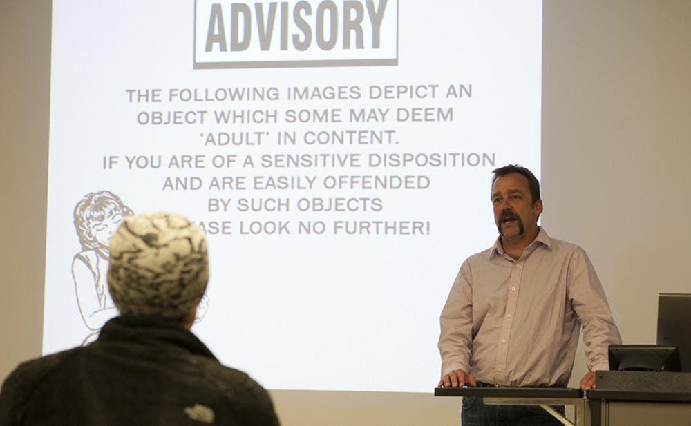 Dean Adams, a ceramic artist, gives his lecture at the Henry Radford Hope School of Fine Arts on Tuesday. Adams teaches at Montana State University and exhibits nationally and internationally and his art and lecture give special attention to the male anatomy.