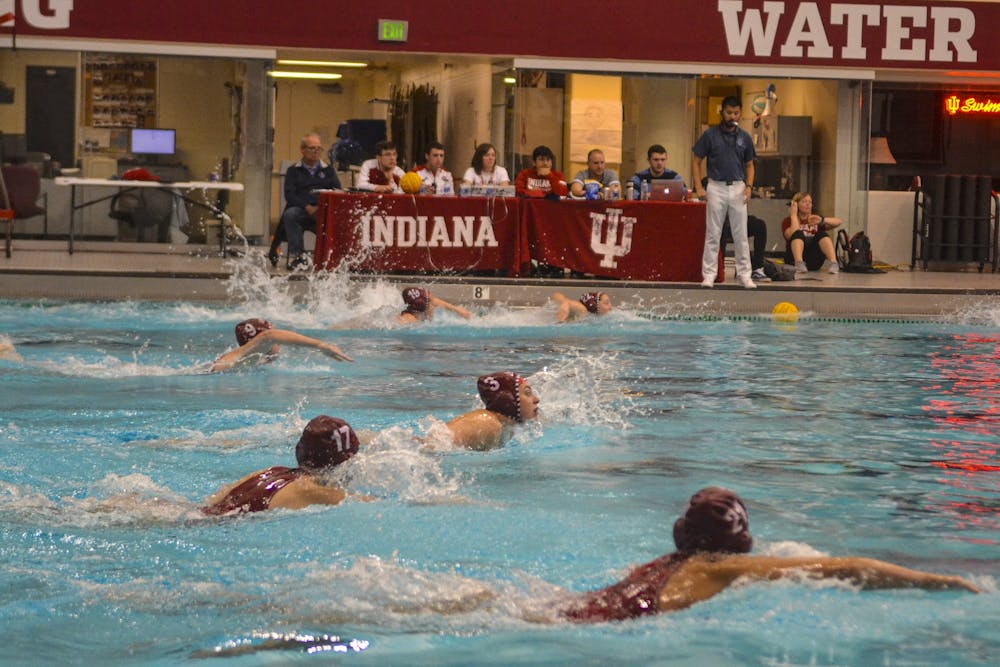 <p>Members of the women’s water polo team swim to the center of the court to start the quarter March 7, 2020, in the Counsilman-Billingsley Aquatics Center. The Hoosiers beat Saint Francis 16-2 on Saturday at the Counsilman-Billingsley Aquatics Center.</p>