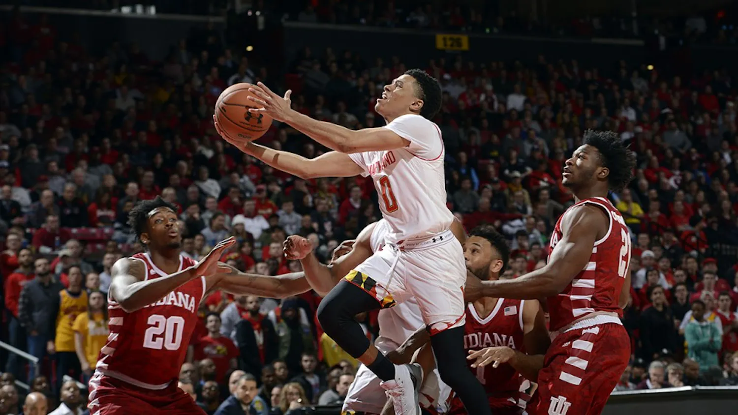 Freshman forward De'Ron Davis and junior forward Freddie McSwain challenge a Maryland layup at the Xfinity Center on Tuesday, Jan. 10.